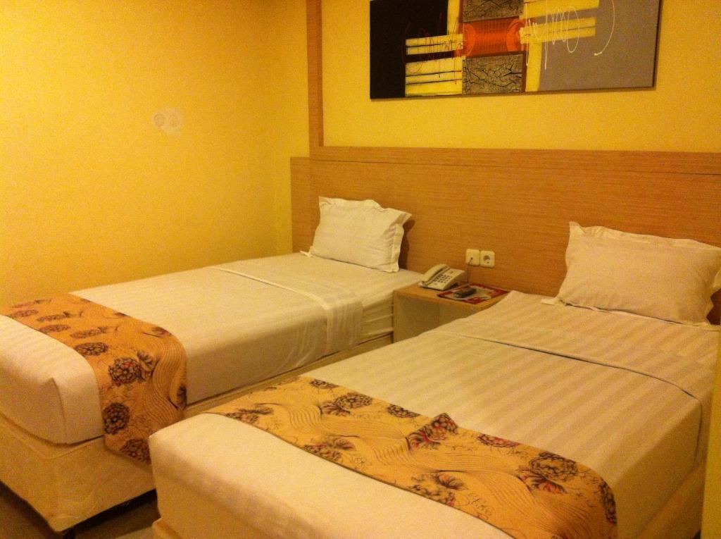 Hotel Paramount Biringkanya Chambre photo