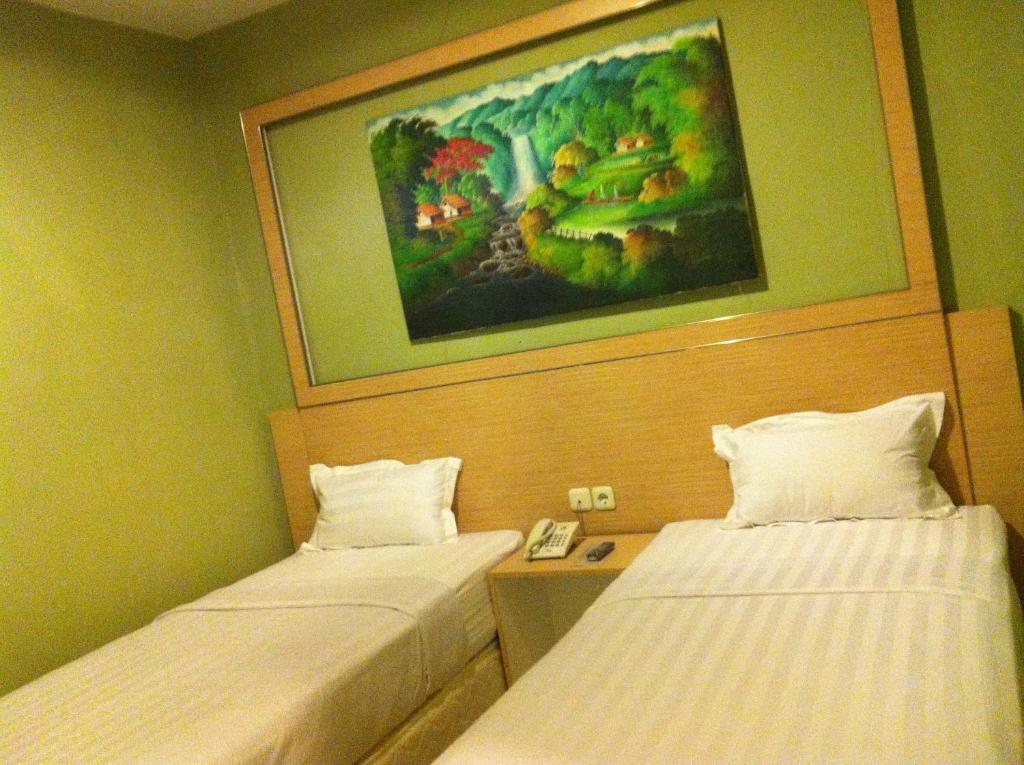 Hotel Paramount Biringkanya Chambre photo