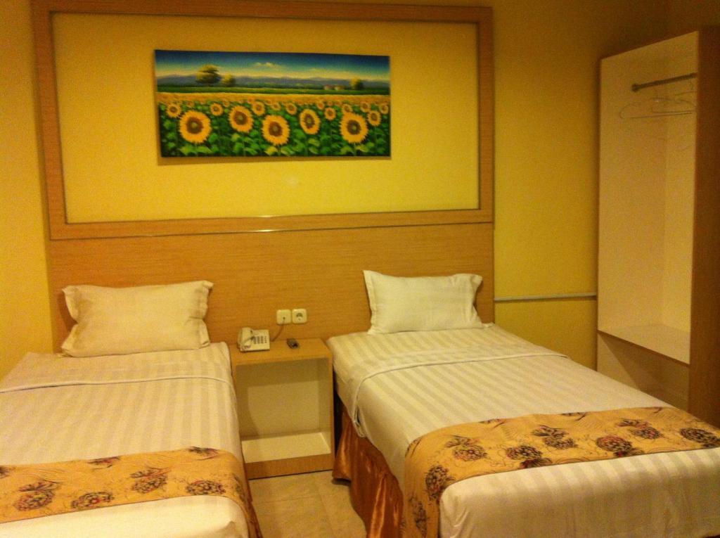 Hotel Paramount Biringkanya Chambre photo